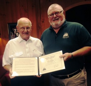 Dave Hyink of the Charles L. Sommers Alumni Association presents Paul R. Christen with his award 