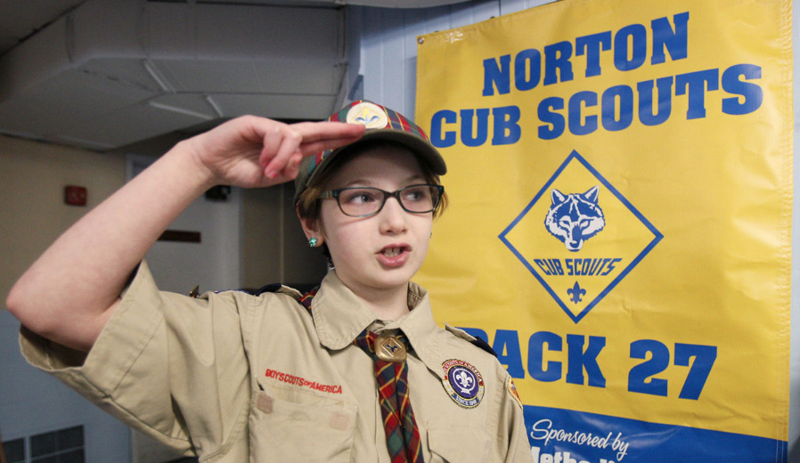 Female Cub Scout Celebrates Her First Official Pinewood Derby Experience